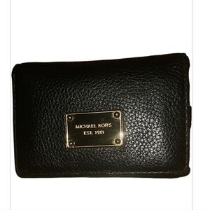 Michael Kors black wallet in great condition. Male or female use. EUC 4x5.5